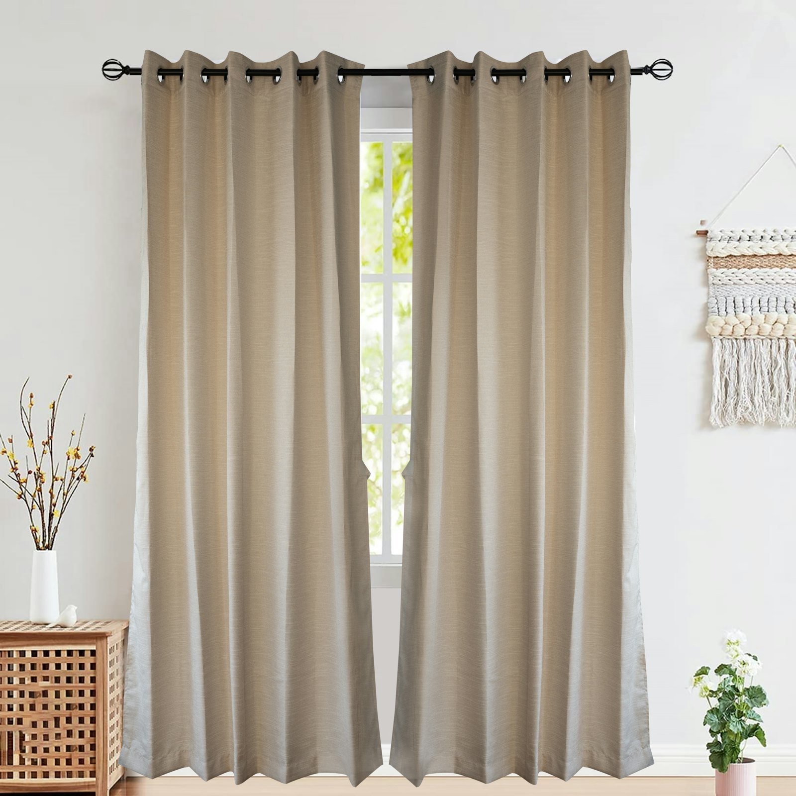 Beige curtains hanging from a black rod